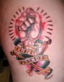 A tasteful tattoo, advertising its owner's love of the cooch.