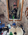 Rob flexing his gear and filthy bathroom.