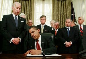 Obama signs executive order 2009 january 2.jpg