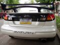 In this image, we have a rear shot of a "modified" Saturn SC2..