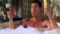 The manchild Adam Sandler in the movie "Billy Madison" acting like a little kid by playing with shampoo and conditioner in the bathtub.